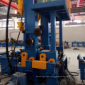 2 people operate space-saving steel beam welding machine for h beam assembly welding straightening